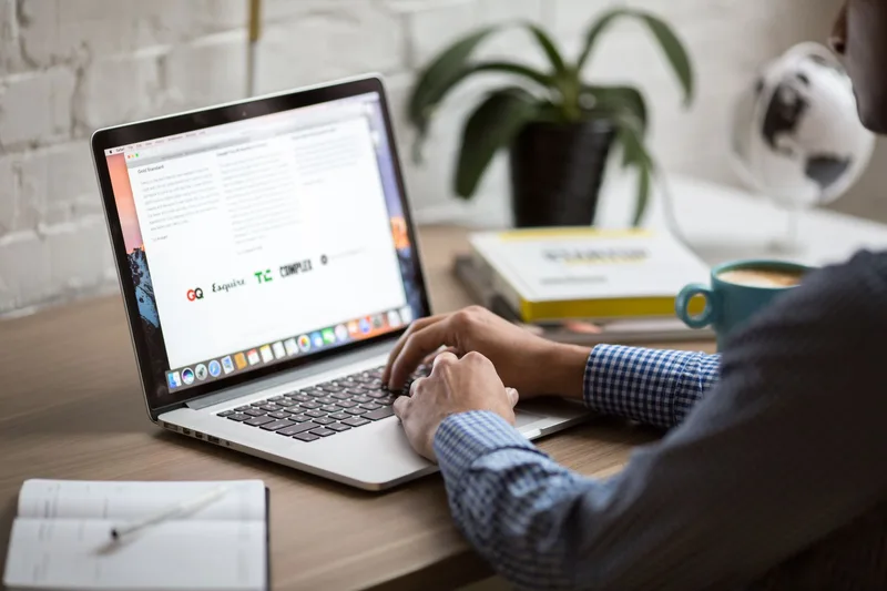 A clean email mockup showing a simple lead magnet delivery email with a prominent download button and short, direct copy