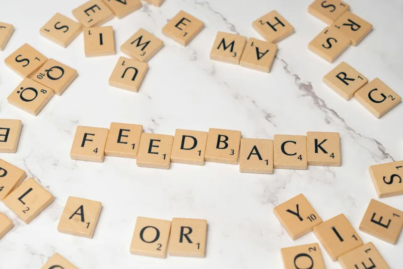 Social proof section from a lead magnet landing page showing a subscriber count and two result-specific testimonials from named people with roles